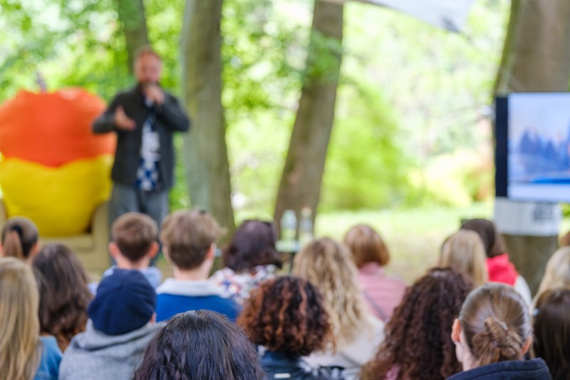 outdoor conference speaker audience